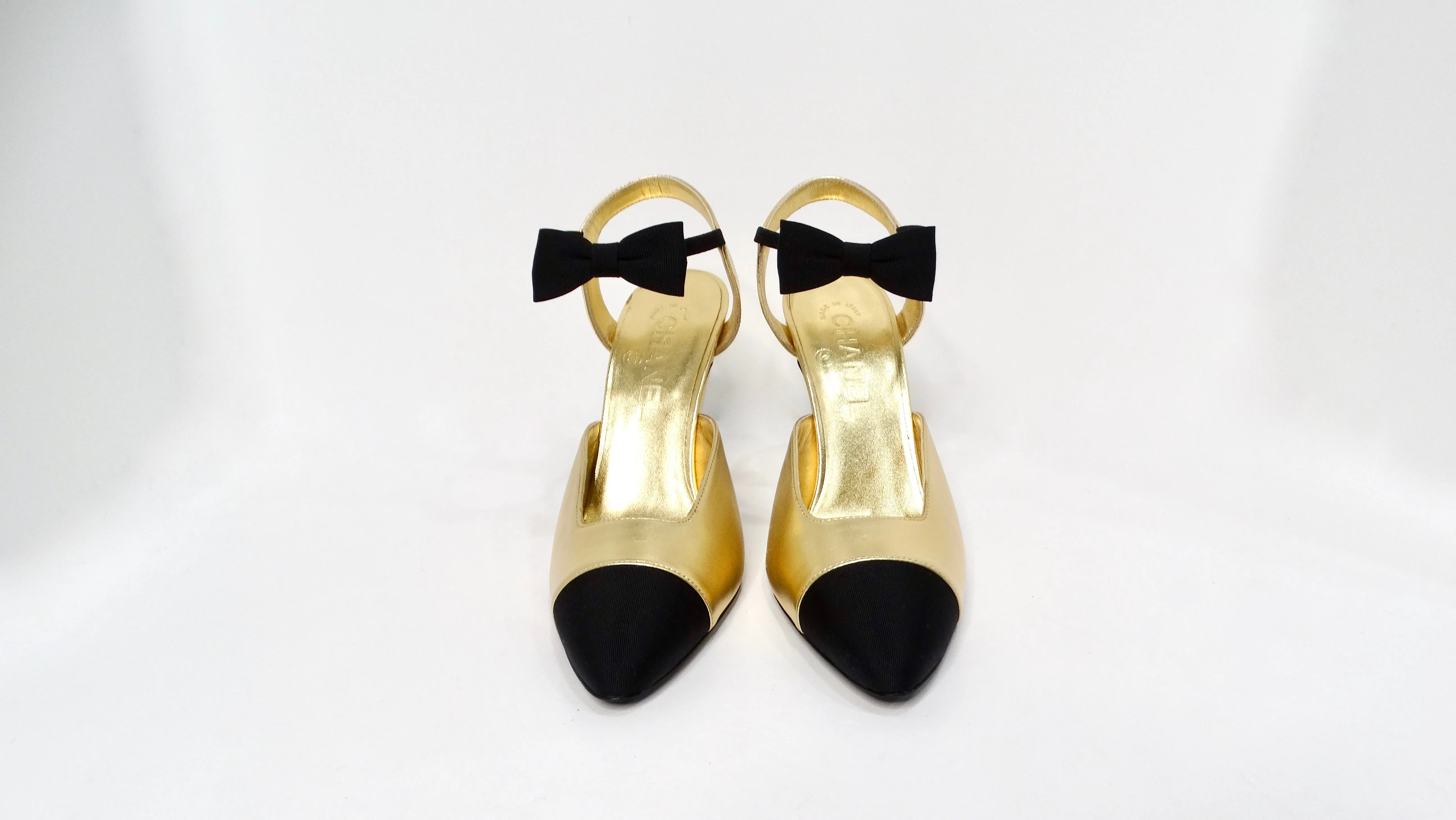 Chanel Gold Metallic Laminated Lambskin Grosgrain Slingback Pumps With Bows