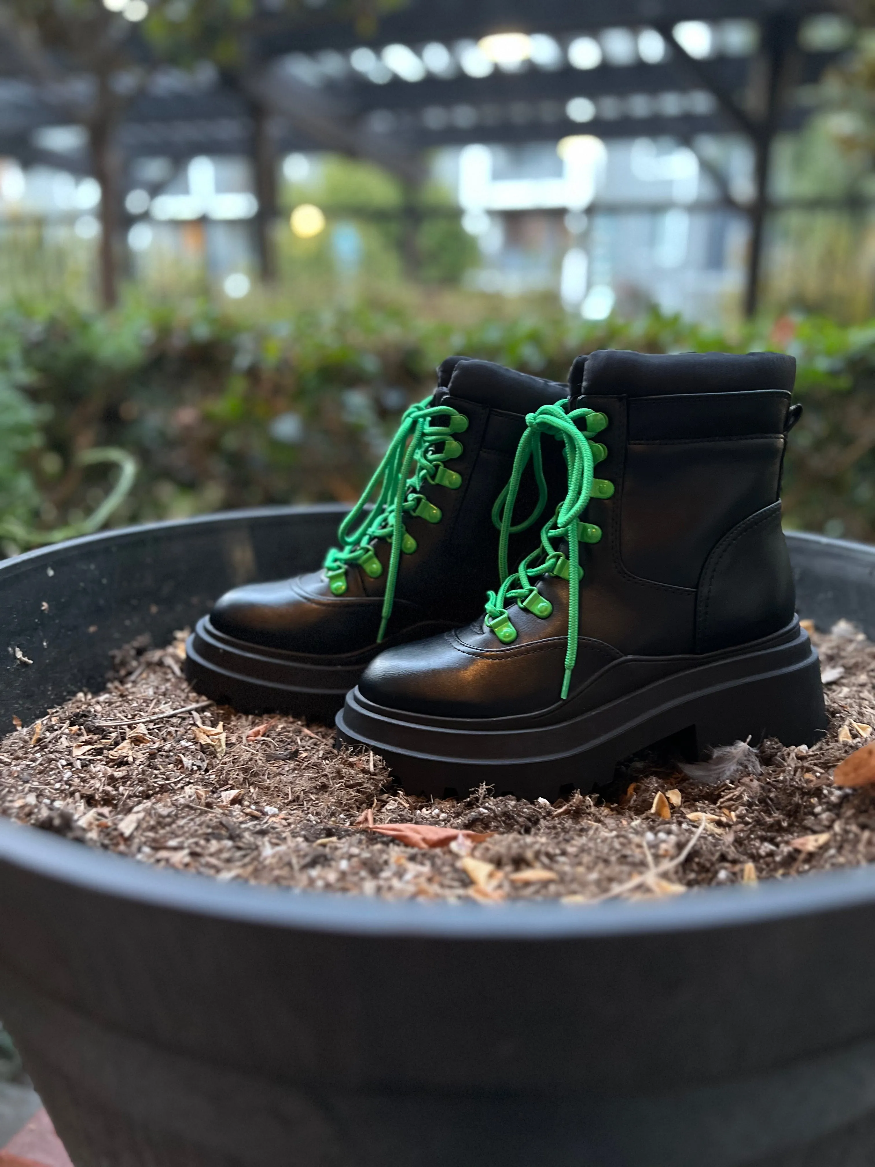 Cute leather lady’s combat boots with green laces!