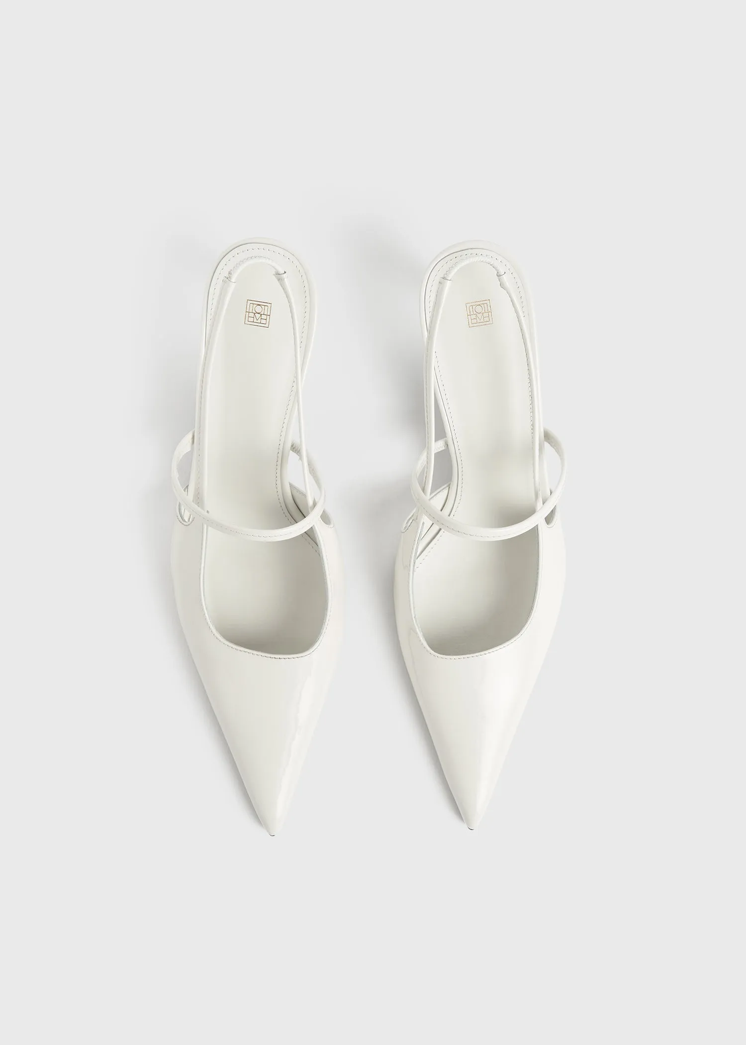 Sharp patent slingbacks off-white